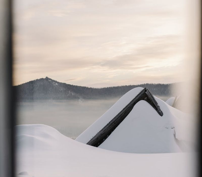 Silhouette of a person stretching at sunrise, representing vitality.